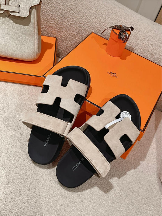 H sandals and LV bag